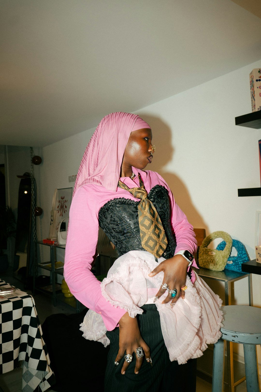woman-in-pink-hijab-and-corset-poses-indoors-jrj0tll40g4